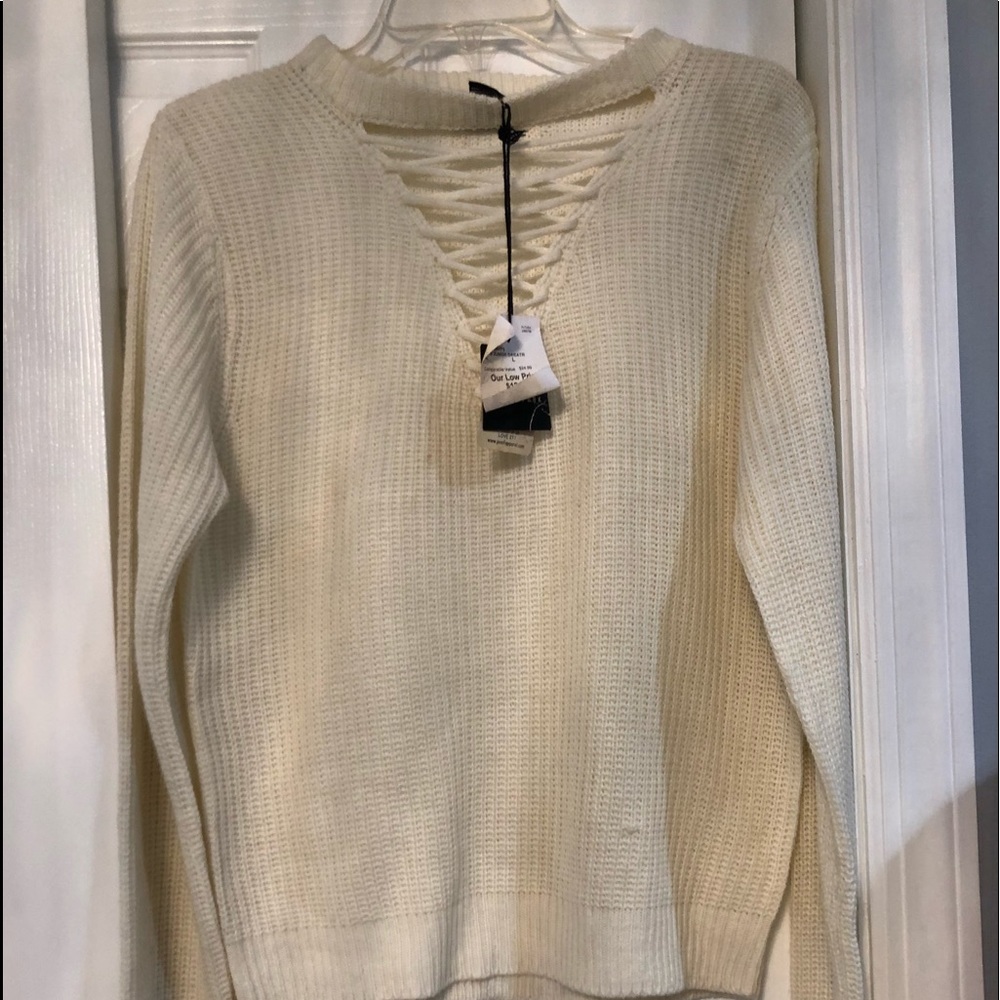 A white lace v Neck sweater